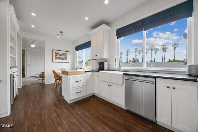 380 S Orange Grove Blvd Unit 6, Pasadena, CA 91105 - kitchen featuring dishwasher, a peninsula, recessed lighting, dark wood-style floors, and white cabinetry