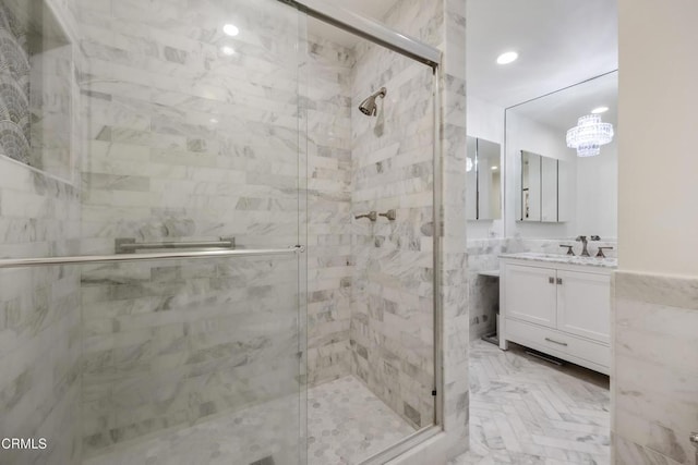 380 S Orange Grove Blvd Unit 6, Pasadena, CA 91105 - bathroom featuring vanity, a shower stall, and a chandelier