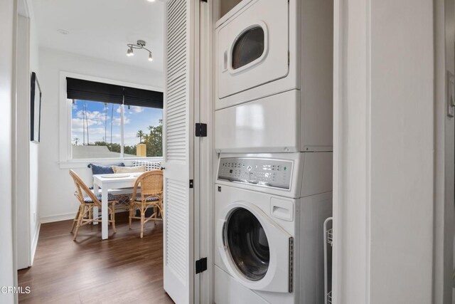 380 S Orange Grove Blvd Unit 6, Pasadena, CA 91105 - washroom featuring stacked washer / dryer and wood finished floors