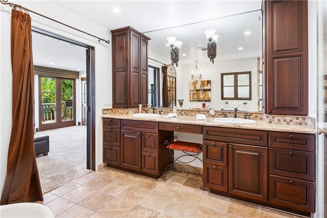 541 Via Del Monte, Palos Verdes Estates, CA 90274 - bathroom with double vanity, backsplash, and recessed lighting