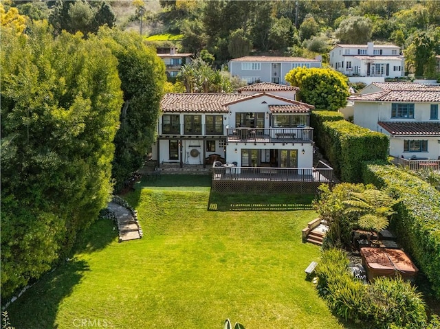 541 Via Del Monte, Palos Verdes Estates, CA 90274 - back of house with a balcony, a lawn, stucco siding, and a tiled roof