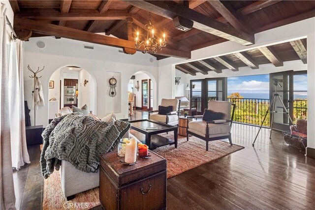 541 Via Del Monte, Palos Verdes Estates, CA 90274 - living area with arched walkways, a chandelier, wooden ceiling, and dark wood-style flooring