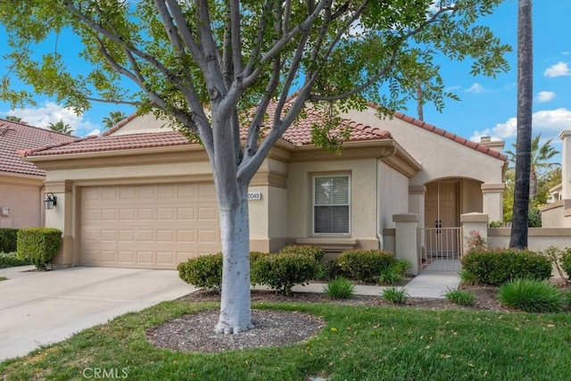 40049 Corte Fortuna, Murrieta, CA 92562 - view of front of house featuring stucco siding, driveway, a tile roof, an attached garage, and a gate