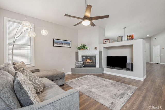 40049 Corte Fortuna, Murrieta, CA 92562 - living area with wood finished floors, a ceiling fan, baseboards, and a fireplace