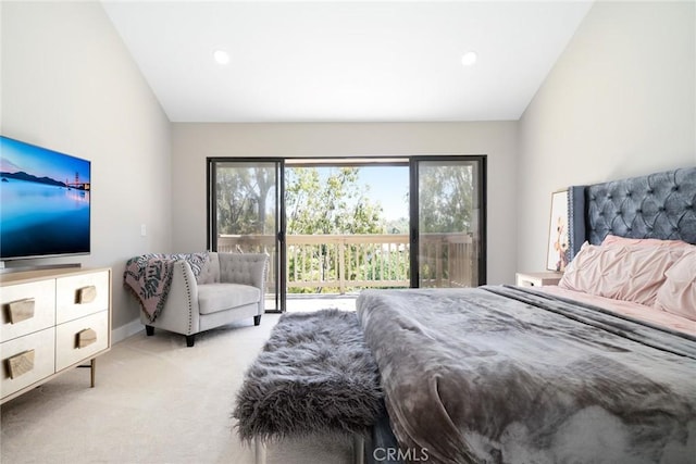 bedroom featuring light colored carpet, vaulted ceiling, baseboards, and access to outside