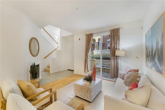 1510 Timberwood, Irvine, CA 92620 - living room with stairway and wood finished floors