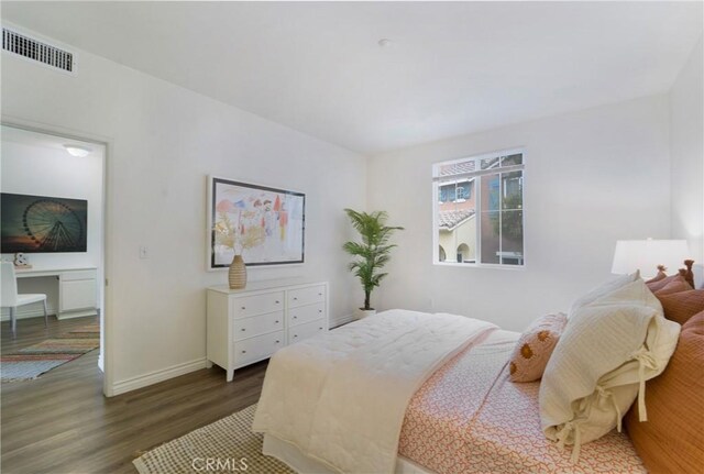 1510 Timberwood, Irvine, CA 92620 - bedroom featuring wood finished floors and baseboards