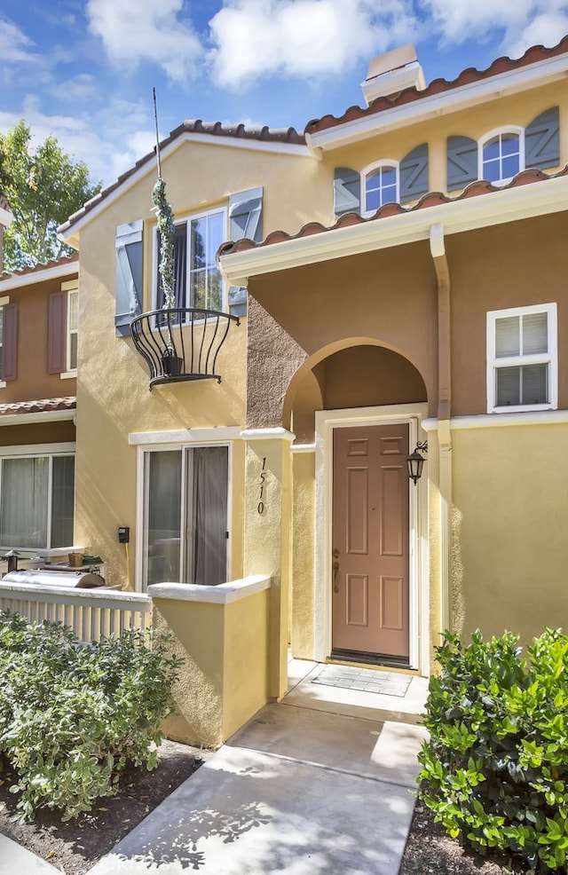 1510 Timberwood, Irvine, CA 92620 - doorway to property with stucco siding