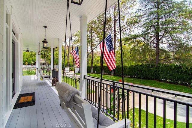 wooden terrace featuring a porch