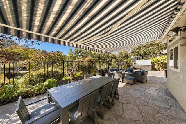 view of patio / terrace with outdoor lounge area, fence, and outdoor dining area