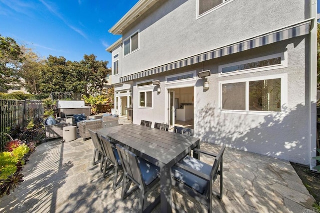 view of patio / terrace with fence and outdoor dining area