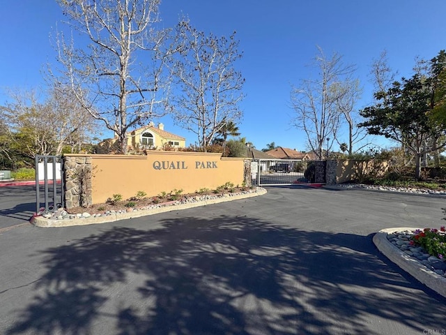 1164 Quail Gardens Ct, Encinitas, CA 92024 - community / neighborhood sign with a gate