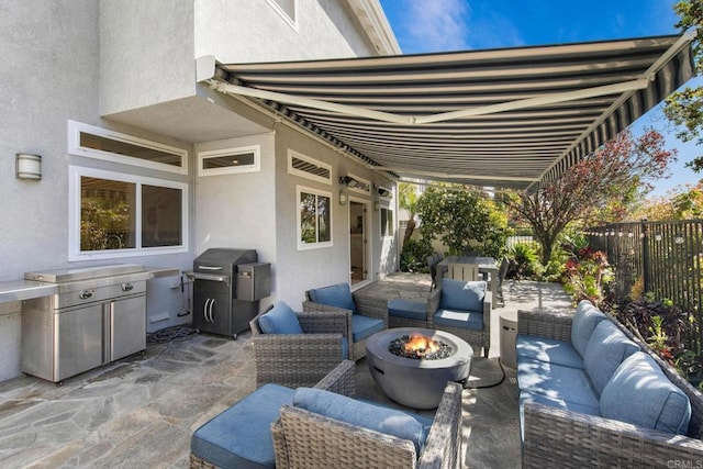 1164 Quail Gardens Ct, Encinitas, CA 92024 - fenced backyard with a patio area, an outdoor living space with a fire pit, and a grill
