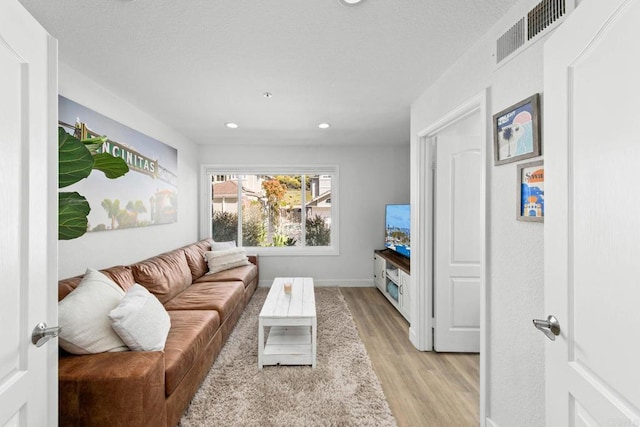 1164 Quail Gardens Ct, Encinitas, CA 92024 - living area with light wood-style floors, recessed lighting, and baseboards