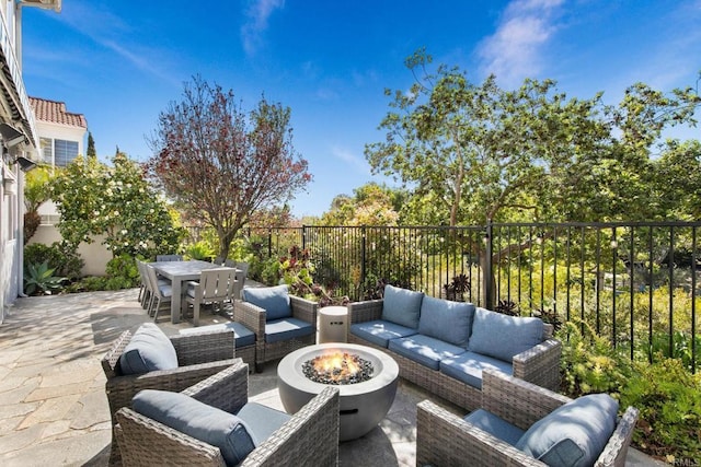 1164 Quail Gardens Ct, Encinitas, CA 92024 - fenced backyard with an outdoor living space with a fire pit, a patio, and outdoor dining area