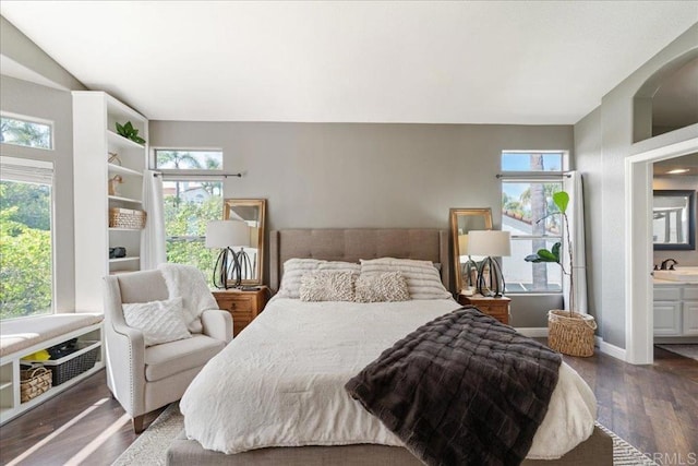4981 Marin Dr, Oceanside, CA 92056 - bedroom with dark wood-type flooring, a sink, baseboards, and multiple windows