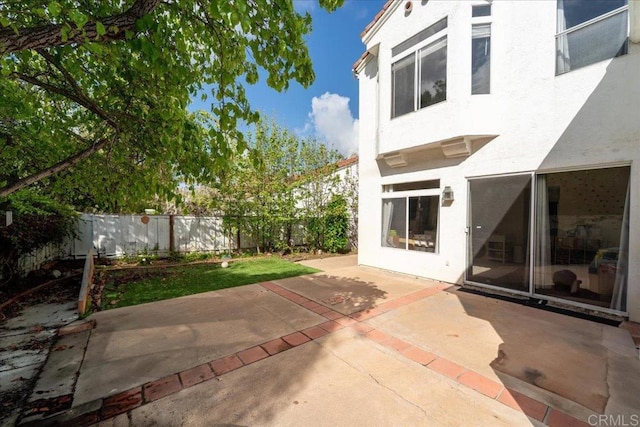 4981 Marin Dr, Oceanside, CA 92056 - exterior space featuring a fenced backyard, a patio area, and stucco siding