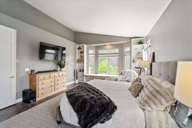 4981 Marin Dr, Oceanside, CA 92056 - bedroom featuring baseboards, lofted ceiling, and dark wood-style floors