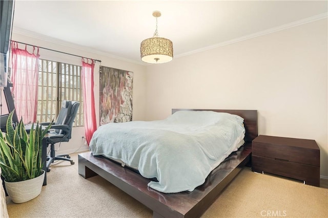 carpeted bedroom with ornamental molding