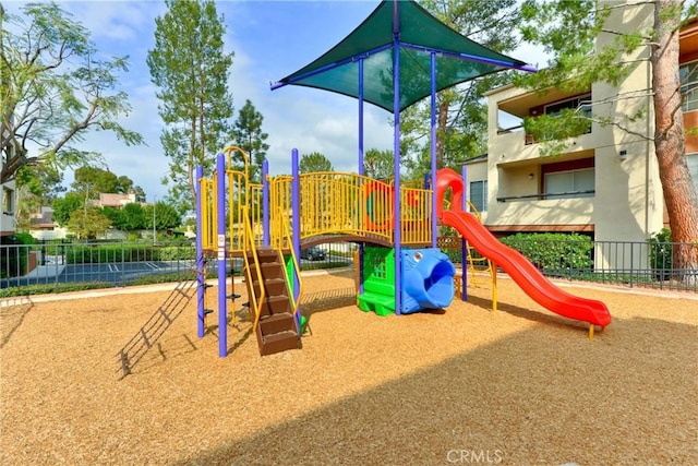 community play area featuring fence