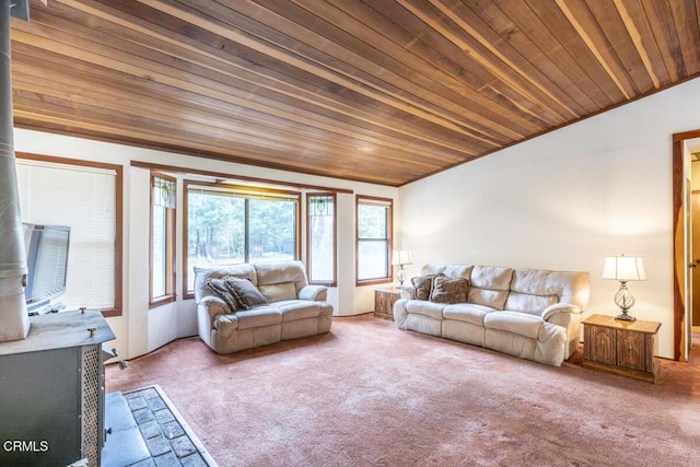 carpeted living room featuring wood ceiling and a wood stove