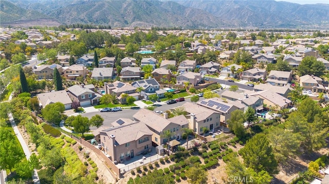 drone / aerial view featuring a mountain view and a residential view