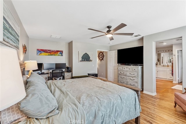 bedroom with light wood-style flooring, ceiling fan, baseboards, and visible vents