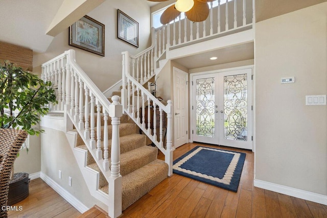 2231 Peninsula Rd, Oxnard, CA 93035 - entryway with french doors, hardwood / wood-style flooring, baseboards, and stairs