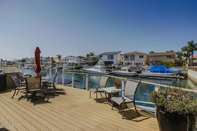 2231 Peninsula Rd, Oxnard, CA 93035 - deck with a water view, a residential view, and a dock