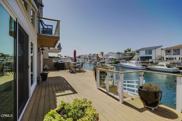2231 Peninsula Rd, Oxnard, CA 93035 - deck with a water view and outdoor dining area
