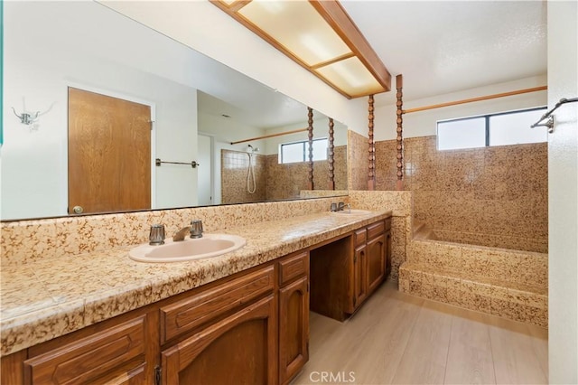 15705 Gila Way, Riverside, CA 92508 - full bathroom with double vanity, a sink, walk in shower, and wood finished floors