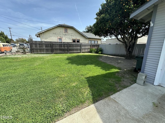 view of yard featuring a fenced backyard