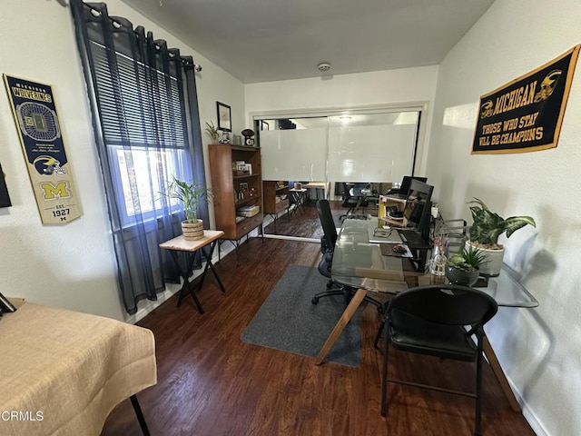 office with baseboards and wood finished floors