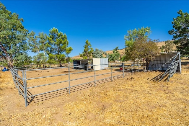 5420 Clayvale St, Acton, CA 93510 - view of yard with an exterior structure, a view of rural / pastoral area, and an outdoor structure