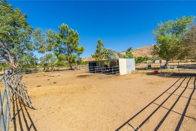 5420 Clayvale St, Acton, CA 93510 - view of yard with an exterior structure, a mountain view, an outbuilding, and a rural view