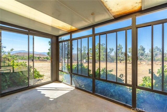 5420 Clayvale St, Acton, CA 93510 - unfurnished sunroom with a mountain view and concrete floors