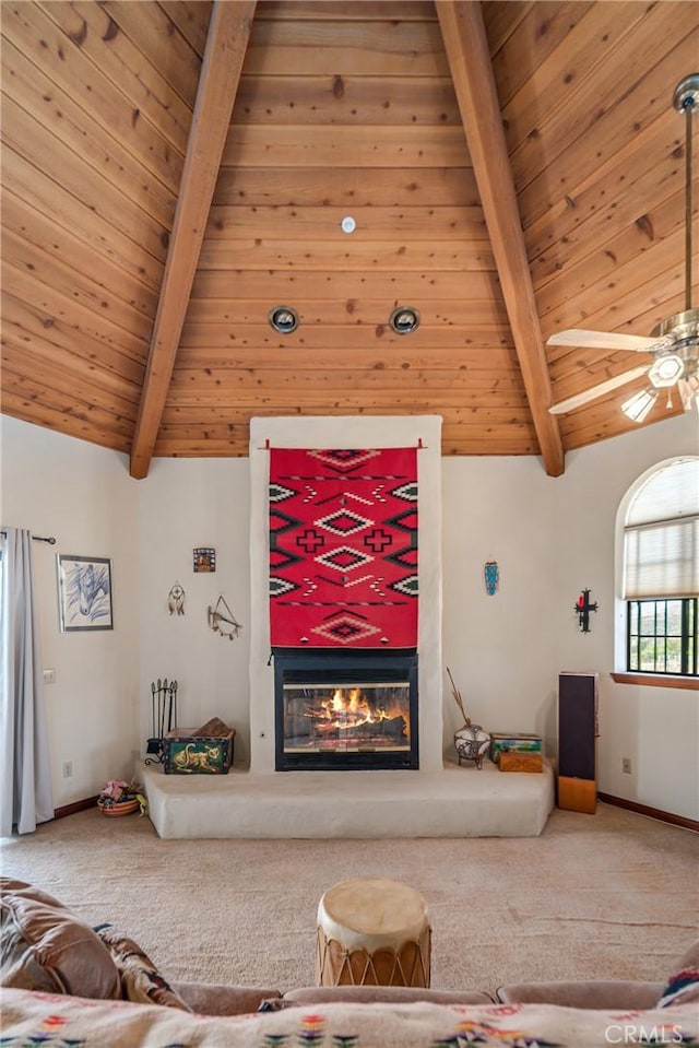 5420 Clayvale St, Acton, CA 93510 - carpeted living area featuring wooden ceiling, a glass covered fireplace, ceiling fan, and baseboards