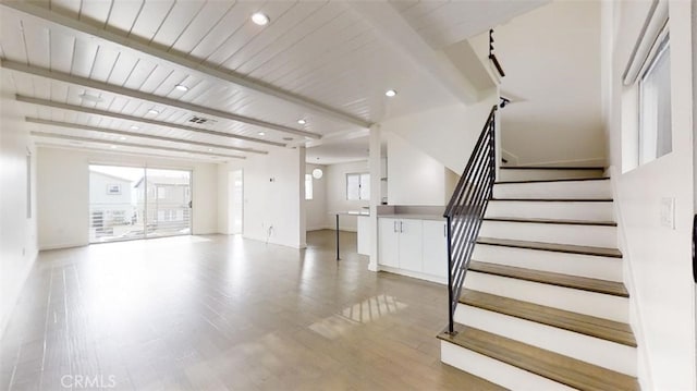 1204 Monterey Blvd, Hermosa Beach, CA 90254 - unfurnished living room featuring healthy amount of natural light, wood finished floors, stairs, recessed lighting, and a wood ceiling with exposed beams