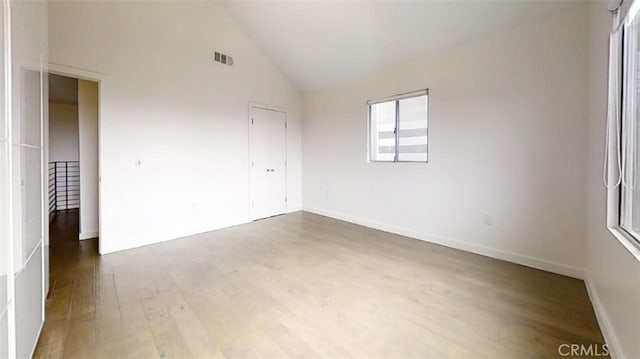 1204 Monterey Blvd, Hermosa Beach, CA 90254 - spare room with wood finished floors and lofted ceiling
