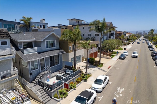 1204 Monterey Blvd, Hermosa Beach, CA 90254 - view of asphalt road featuring sidewalks, curbs, and a residential view