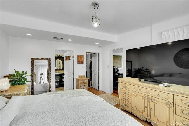 bedroom with visible vents, recessed lighting, and light wood-style floors