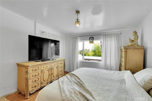 bedroom featuring light wood-type flooring