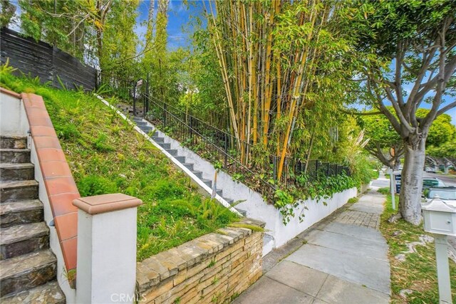 view of property's community with fence