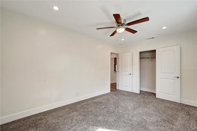 unfurnished bedroom featuring a closet, a ceiling fan, recessed lighting, baseboards, and carpet