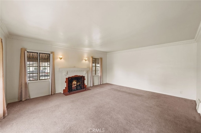 unfurnished living room featuring a fireplace with flush hearth, carpet floors, ornamental molding, and plenty of natural light
