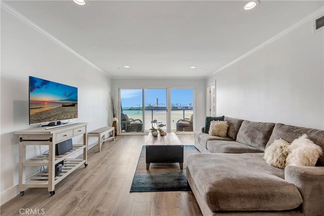 1 3rd Pl Unit 302, Long Beach, CA 90802 - living area with ornamental molding, wood finished floors, recessed lighting, and baseboards