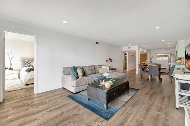 1 3rd Pl Unit 302, Long Beach, CA 90802 - living area featuring light wood-style floors, recessed lighting, and baseboards