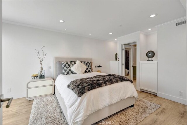1 3rd Pl Unit 302, Long Beach, CA 90802 - bedroom featuring light wood-style flooring, crown molding, recessed lighting, and baseboards