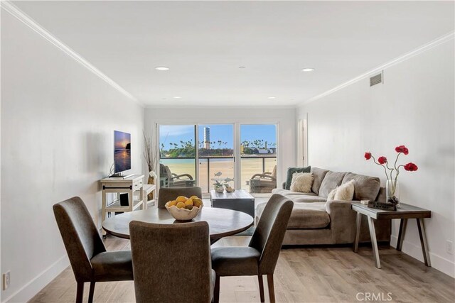 1 3rd Pl Unit 302, Long Beach, CA 90802 - dining room with crown molding, baseboards, light wood-style flooring, and recessed lighting
