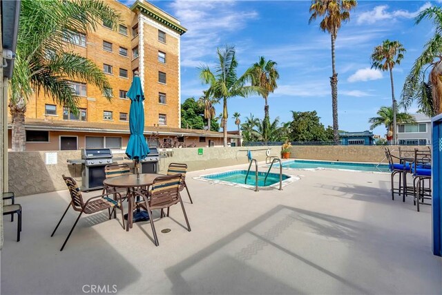 1 3rd Pl Unit 302, Long Beach, CA 90802 - community pool featuring a patio area and area for grilling